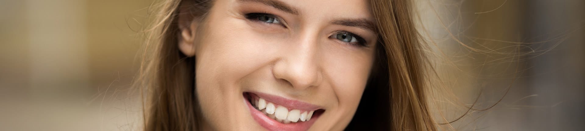 A beautiful woman is smiling